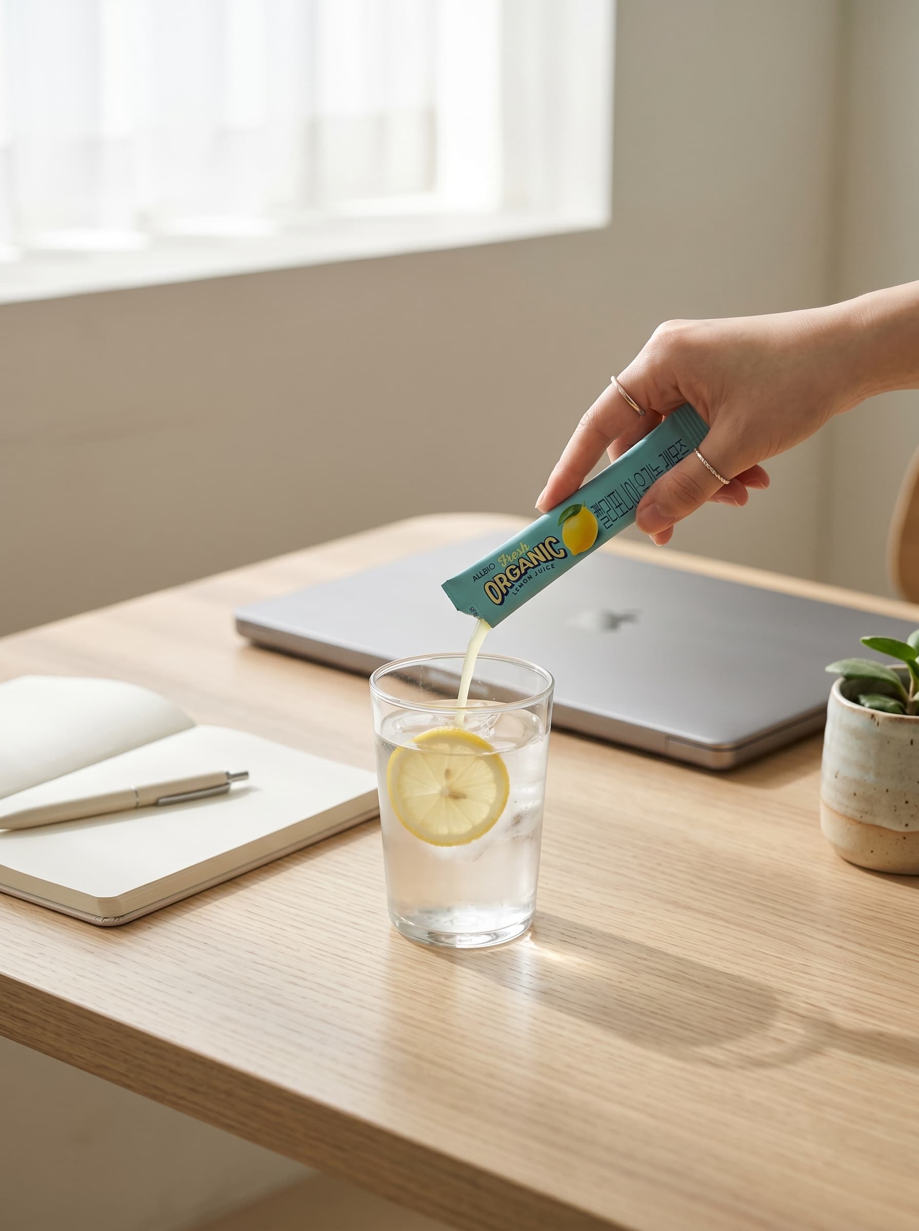 ALLBIO Lemon Juice stick at modern desk